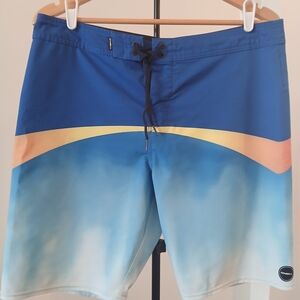 O'Neill Blue and Orange Gradient Board Shorts